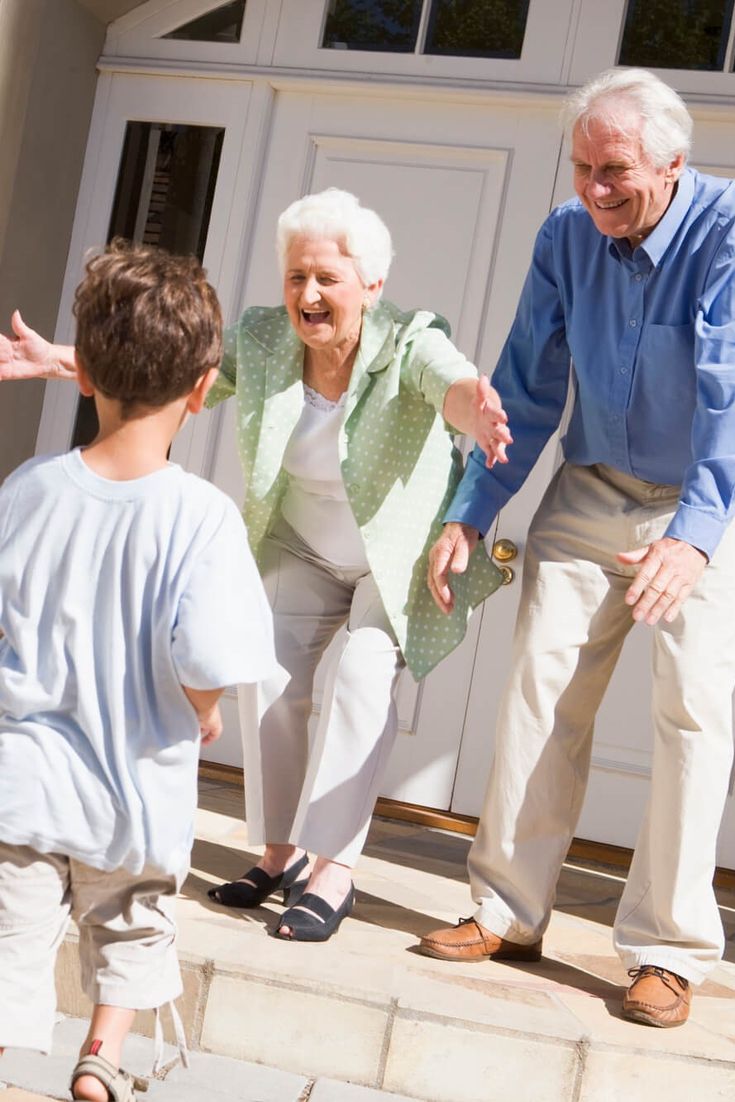 active mature couple smiling outdoors